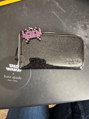 kate spade black glitter zip wallet with pink pixel charm